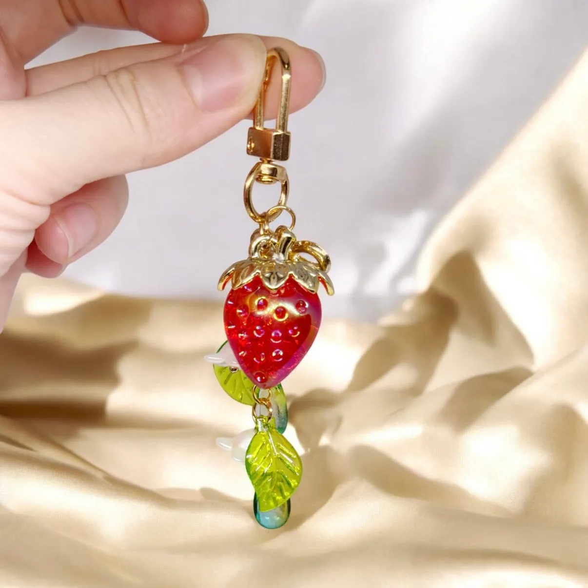 Strawberry bag charm | key chain | golden chain with flowers and leaf