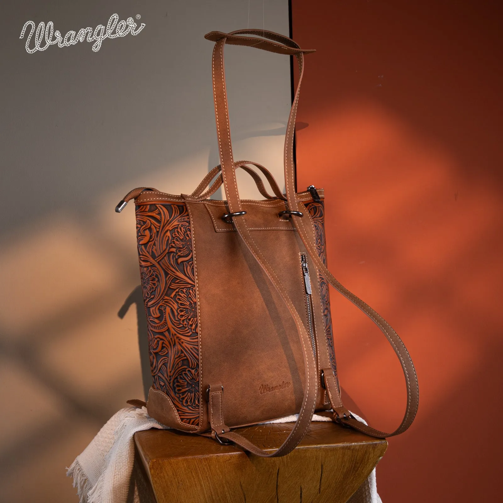 WG169-9112 Wrangler Genuine Hair-On Cowhide Floral Tooled Convertible Backpack/Crossbody - Brown)